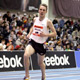  New Zealand's Nick Willis tracking Australia's Craig Mottram in the Men's 3000m.