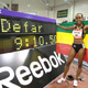  Meseret Defar poses next to her new world record mark for the indoor two mile.