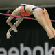  American recorld holder and Olympic silver medalist Jenn Stuczysnki clears the bar and secures her win.