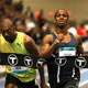  Renny Quow of Trinidad holds off former World Cup Champion Michael Blackwood of Jamaica in the Men's 400m.